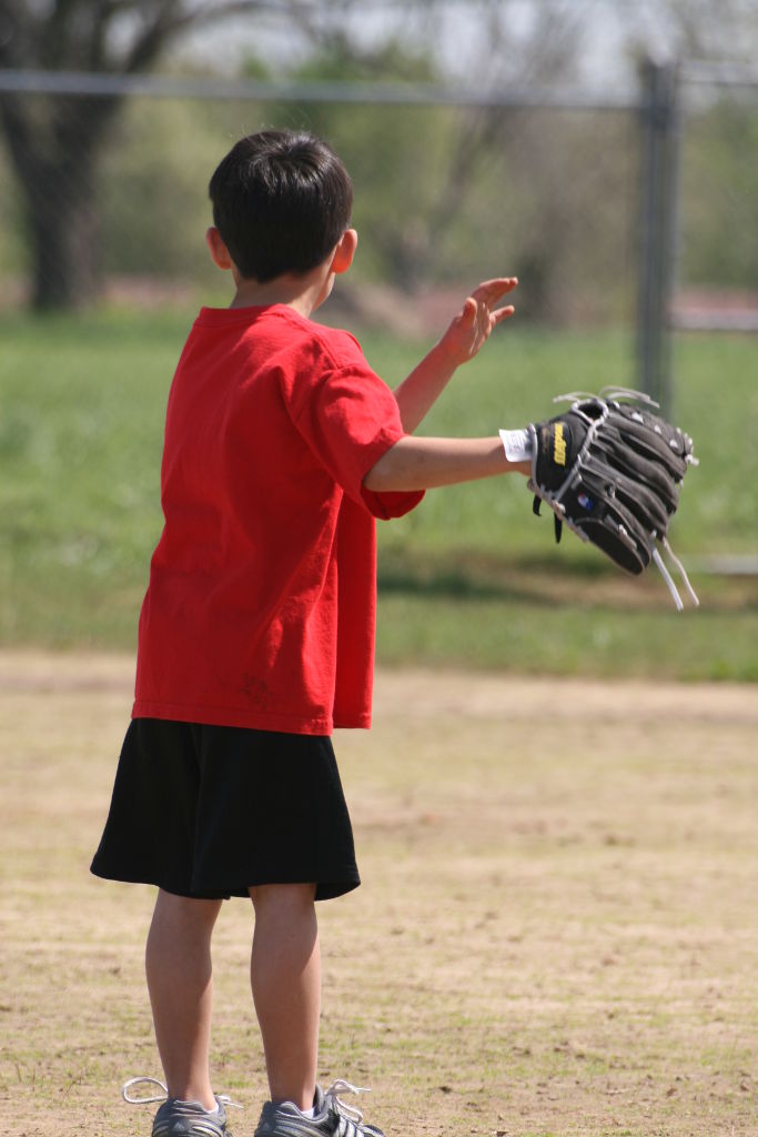 kid playing baseball