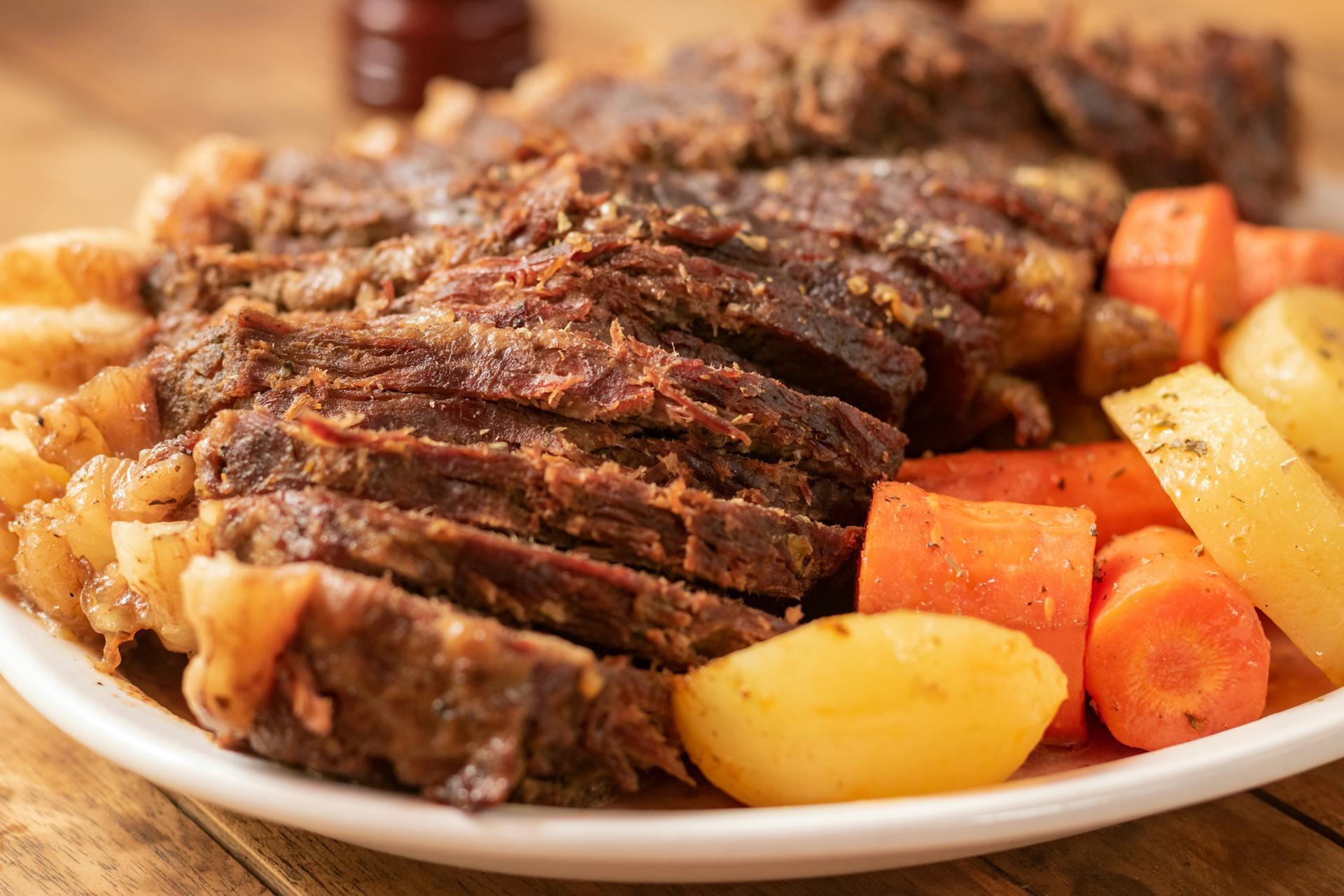 beef pot roast with vegetables on plate